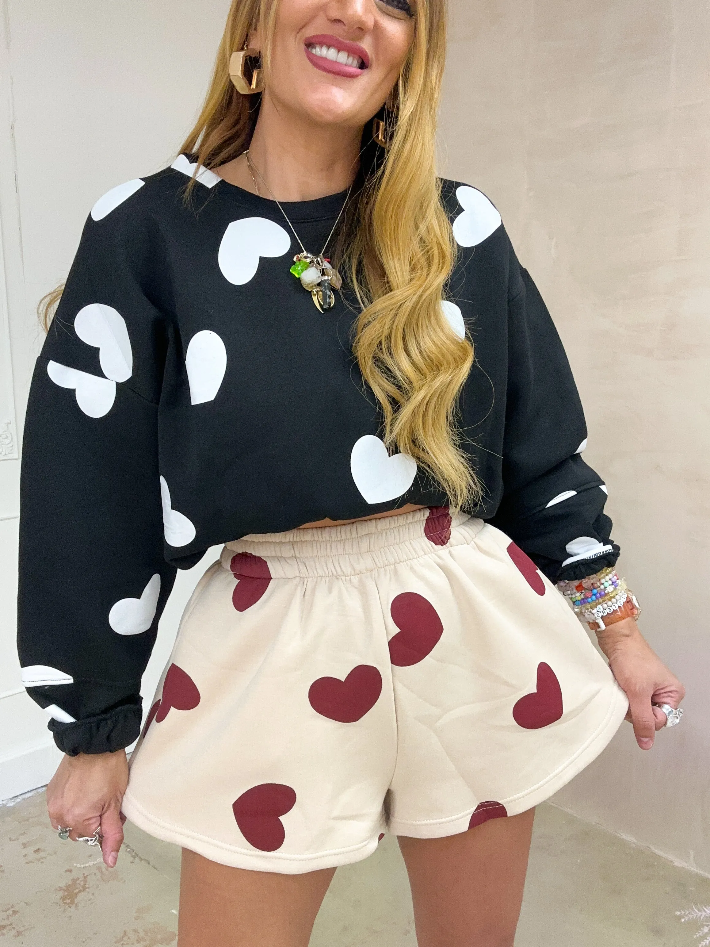 All Over Scattered Heart Sweatshirt In Black