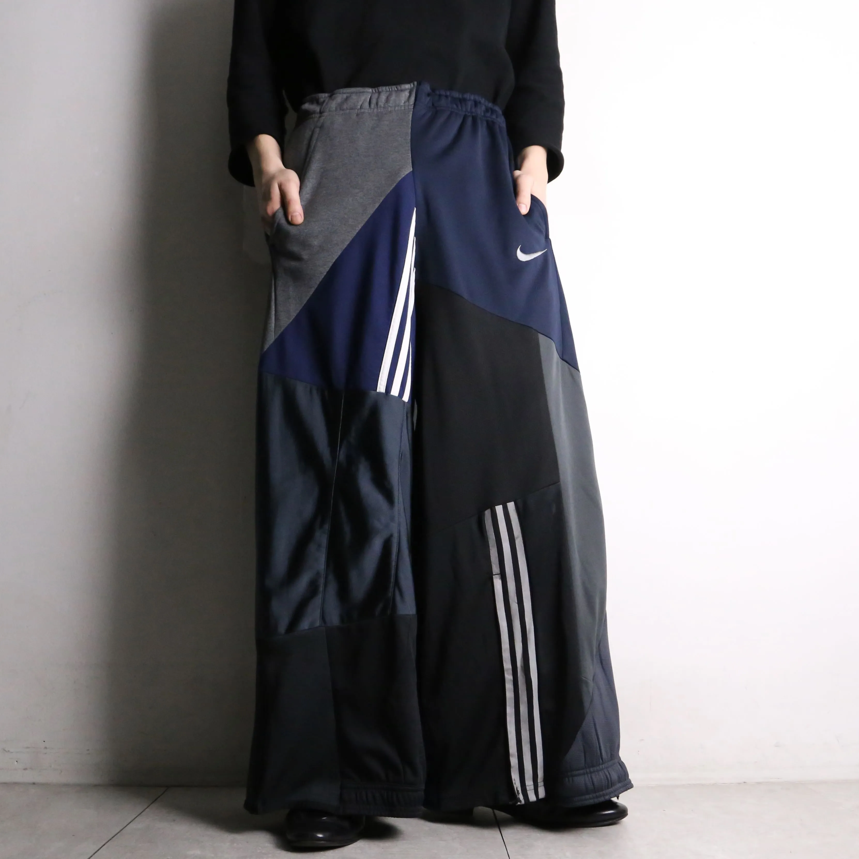 remake "再構築" navy color patchwork design track pants