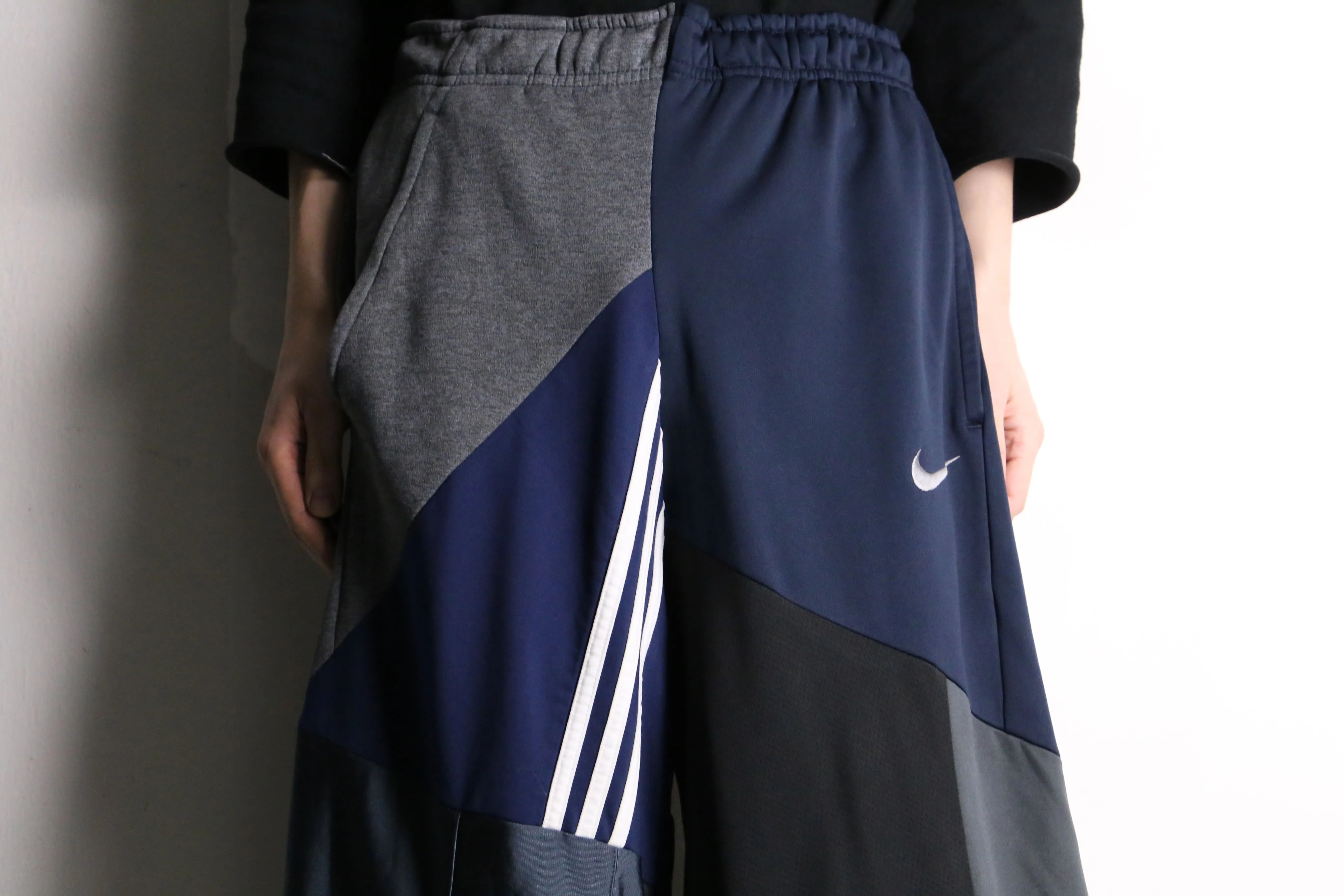 remake "再構築" navy color patchwork design track pants