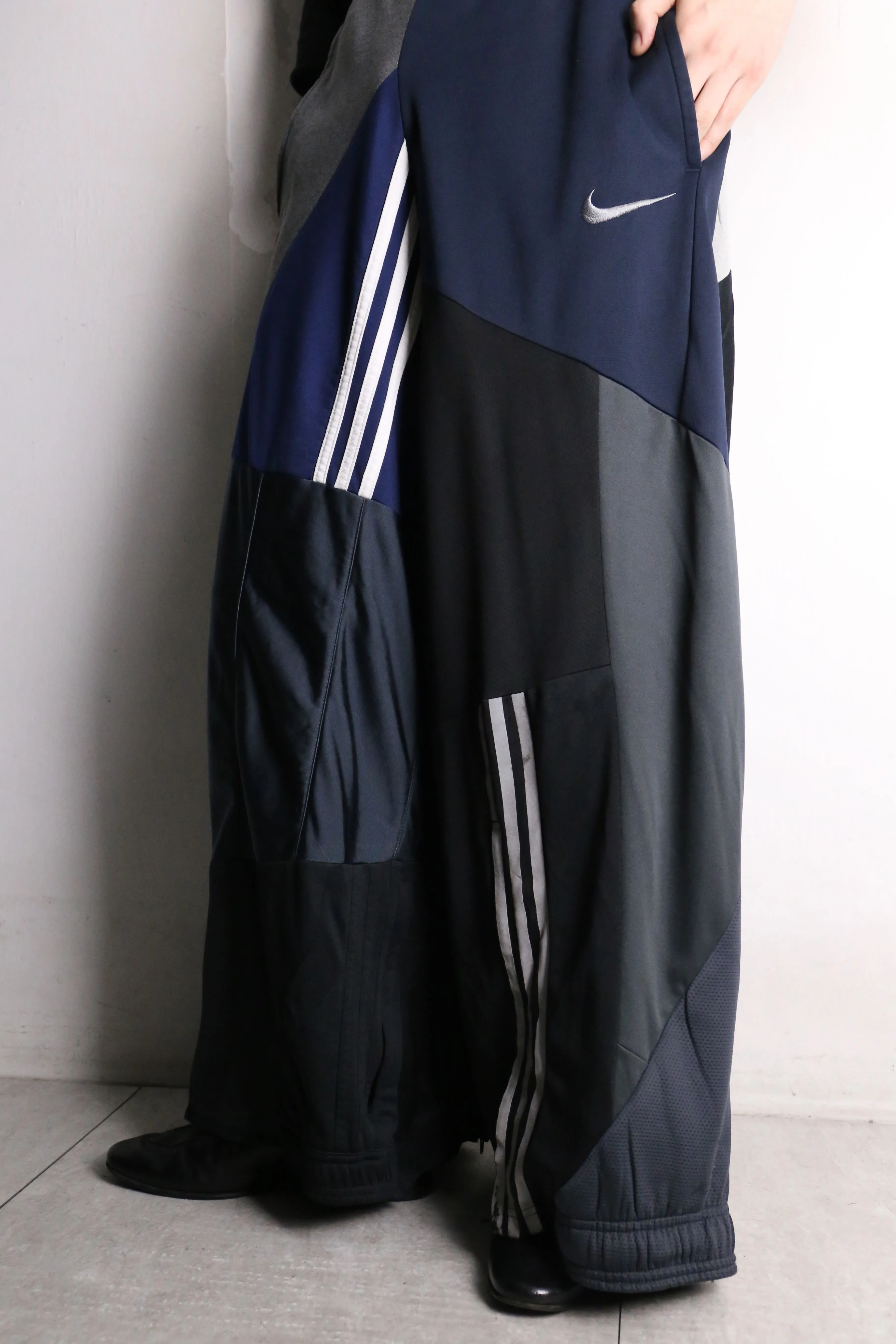 remake "再構築" navy color patchwork design track pants